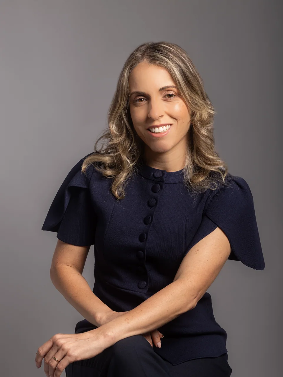 Retrato profissional de Andressa Valle Medeiros, advogada do Outeiral Advocacia.